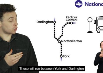 National Rail graphic showing a route map between York, Northallerton, Darlington, and Redcar Central, with bus replacement icons.
A presenter gestures to the map while a sign language interpreter appears; subtitles mention services running between York and Darlington.
