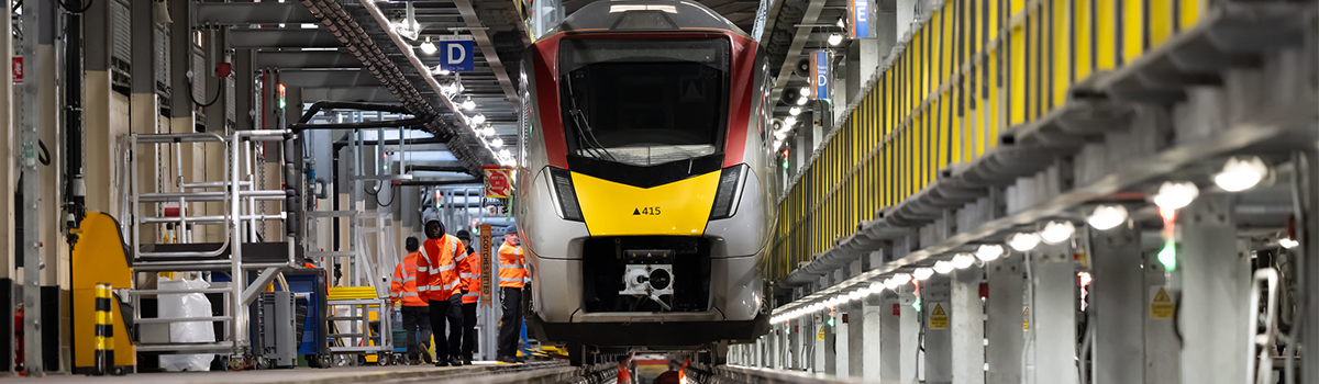 Train being built at a depot