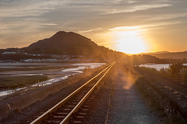 Train tracks at sunset